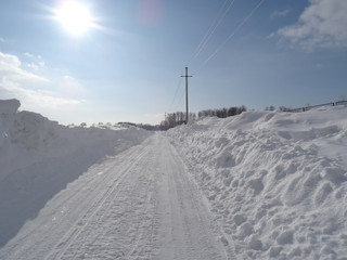 Fototapeta na wymiar road in winter in snow