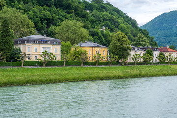 Fototapeta na wymiar Majestic river in City in Salzburg, Austria.