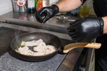 The process of roasting squid. Delicious seafood.