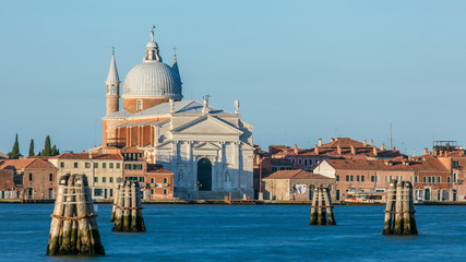 Fototapeta na wymiar View on the lagoon of Venice with Chiesa church del Santissimo Redentore located on Giudecca island in the sestiere of Dorsoduro timelapse