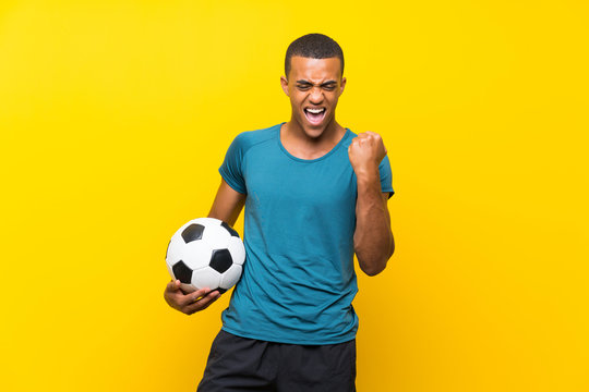 African American Football Player Man Celebrating A Victory