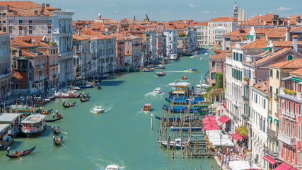 Fototapeta na wymiar Top view on central busy canal in Venice timelapse, on both sides masterpieces of Venetian architecture