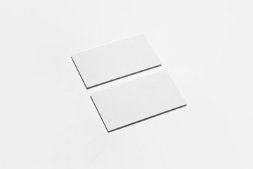 Horizontal Business Cards Mock-up on white background.Paper texture.High resolution photo.Top view