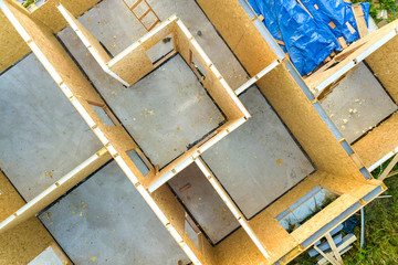 Construction of new and modern modular house. Walls made from composite wooden sip panels with...