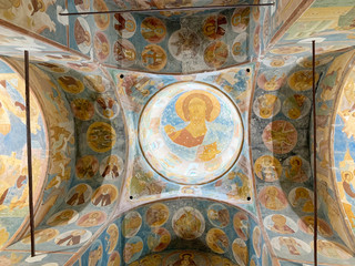 Fototapeta na wymiar Ferapontov monastery. Frescoes of Dionysius in the Cathedral of the Nativity of the virgin. The image of Christ the Pantocrator in the dome