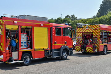 Fototapeta na wymiar Big red fire truck with fire equipment