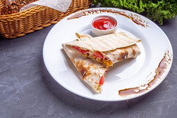 pita meat roll with chicken meat tomato cheese and corn