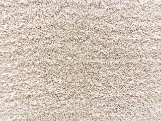 Close-up of a white shaggy carpet for background and texture.