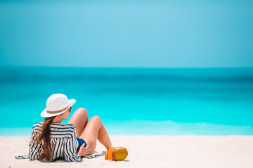 Young beautiful woman on beach vacation on Caribs