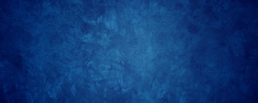 dark blue grunge cement wall background.