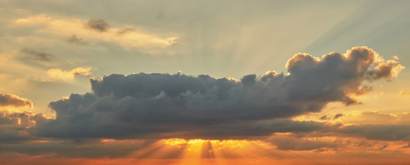 beautiful mediterranean sky at sunset in red and orange tones with sun rays © Helena GARCIA