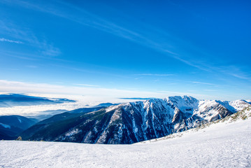 Fototapeta na wymiar Winter mountain landscape with fog in valley. Tatra Mountains