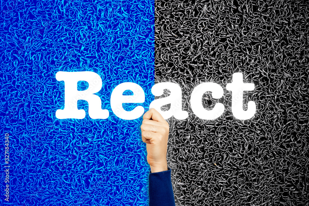 Wall mural react front end programming language concept. woman developer with her hand holding modern sign with