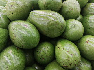 Group of fresh avocados in the market.