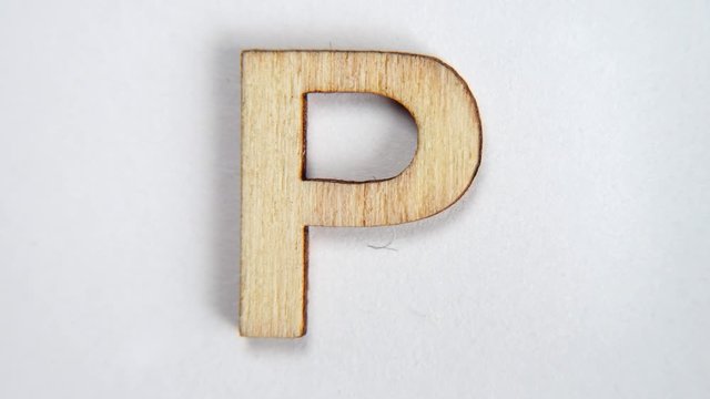 Letter P of the English alphabet in motion. Letter moves on a white background. Writing font concept. Stop motion.