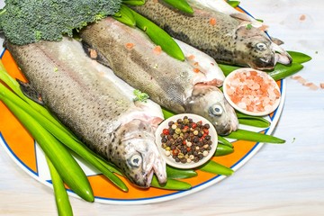 Raw river trout . Fresh sea fish . healthy food, vegetarian.