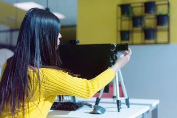 Giving advice. Beautiful young woman smiling while making social media video, Recording her self and streaming to online platform.
