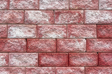pink red brick wall texture background. close up