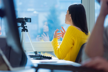 Giving advice. Beautiful young woman smiling while making social media video, Recording her self...