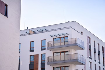 New building condominium. Modern apartment complex exterior.