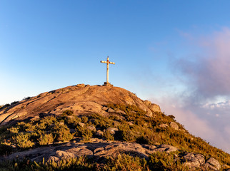 Cross on top of the Bandeira Peak (Pico da Bandeira) at sunset, Caparao National Park, Espirito Santo, Brazil