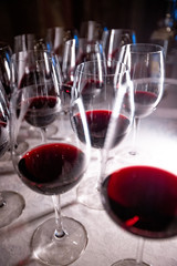 two glasses of red wine on table