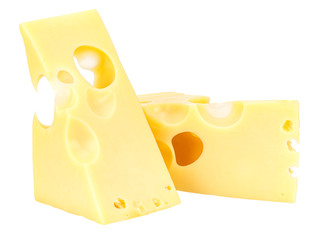 Standing and lying two triangular pieces of Maasdam cheese isolated on a white background