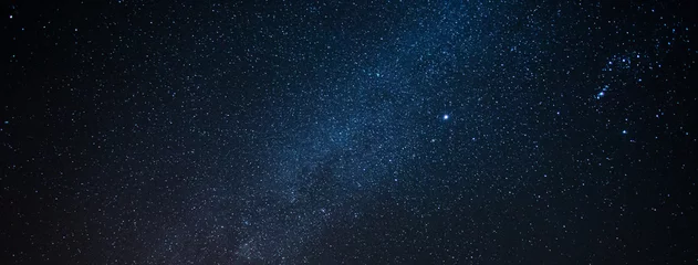 Foto op Plexiglas Melkwegstelsel met ster en ruisblauwe achtergrond, abstracte melkwegstelsel met sterren voor achtergrond © minicase