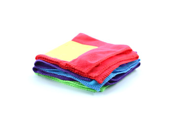 Stack of colorful rags isolated on white