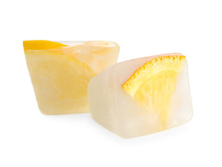 Ice cubes with oranges on white background