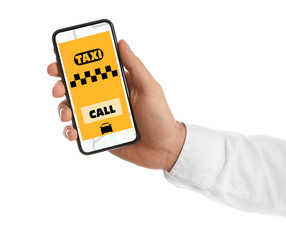 Man ordering taxi with smartphone on white background, closeup