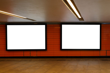 2 horizontal billboards on the orange wall underground. Mock-up.