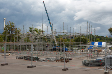 Installation of portable stands and a concert venue.