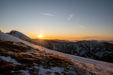 Sunrise in snowy mountains, Slovakia Low Tatras, dumbier