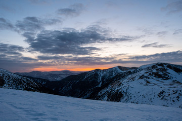 Fototapeta na wymiar Blue hour before sunrise in snowy mountains, Slovakia Low Tatras, dumbier
