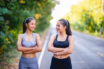 Women exercise happily for good health. Exercise concept