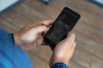 Person looking at a personal assistant bot on a phone