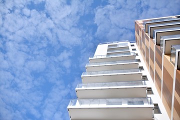 New building condominium. Modern apartment complex exterior.