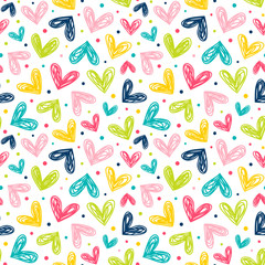 Hearts and dots in doodle style. Seamless vector pattern in bright color palette.