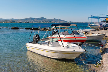 Fototapeta na wymiar Motor boats for sea cruises on the beach in Kolymbia, Rhodes. Greece