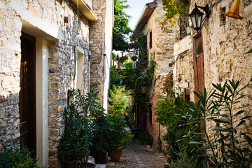 Fototapeta na wymiar Lefkara village street in Cyprus. Old villega street with plants in an amazing place
