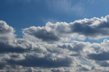 Blurry image of cloudy sky. Blue sky and white clouds. Colorful nature background.