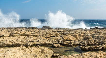 waves splashing on a rocky shore