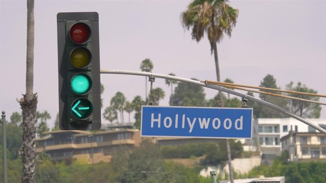 Hollywood boulevard street sign and traffic lights in 4k in slow motion 60fps