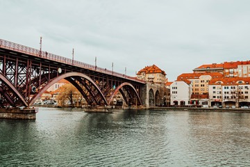 Fototapeta na wymiar Old Bridge or Main Bridge over the Drava River in the city of Maribor, Slovenia. Europe.