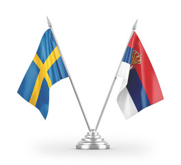 Serbia and Sweden table flags isolated on white 3D rendering