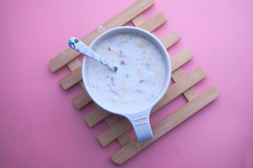 top view of baby food on color background 