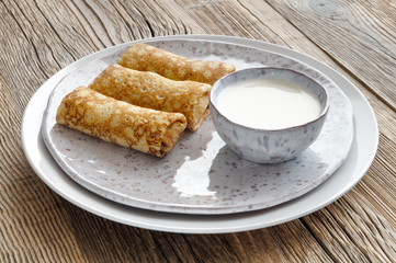 wheat creepers with filling  and sour cream