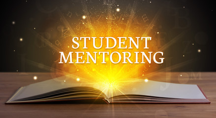 STUDENT MENTORING inscription coming out from an open book, educational concept