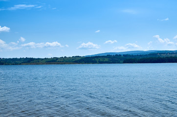 Vlasina lake in Serbia and picturesque hills in distance in summer